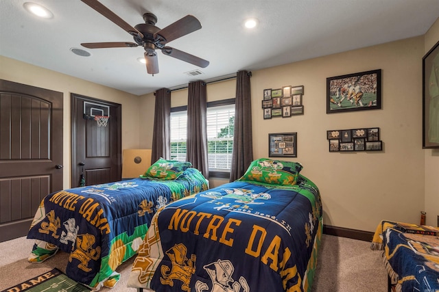 carpeted bedroom featuring recessed lighting, baseboards, and ceiling fan