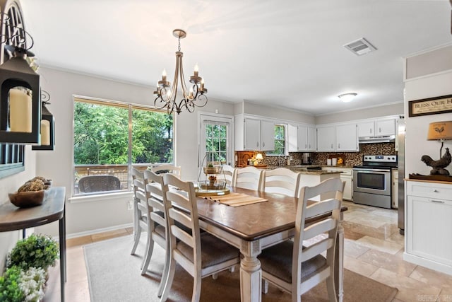 3311 Hazy Ridge Ct, Little Rock, AR 72227 - dining space with a chandelier, ornamental molding, and healthy amount of natural light