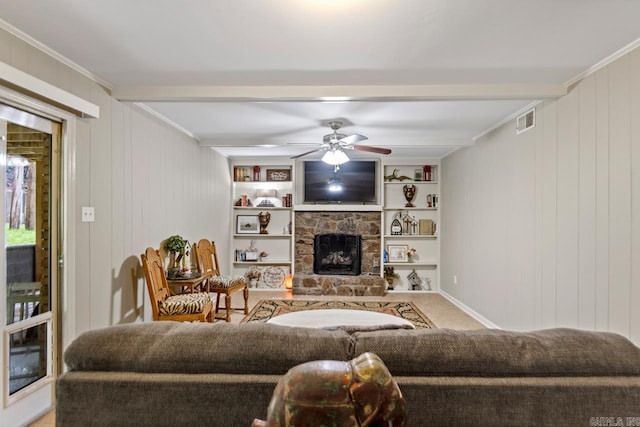 3311 Hazy Ridge Ct, Little Rock, AR 72227 - carpeted living area with a ceiling fan, a fireplace, beamed ceiling, and ornamental molding