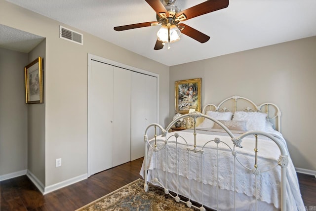 3311 Hazy Ridge Ct, Little Rock, AR 72227 - bedroom with wood finished floors, baseboards, a closet, and ceiling fan