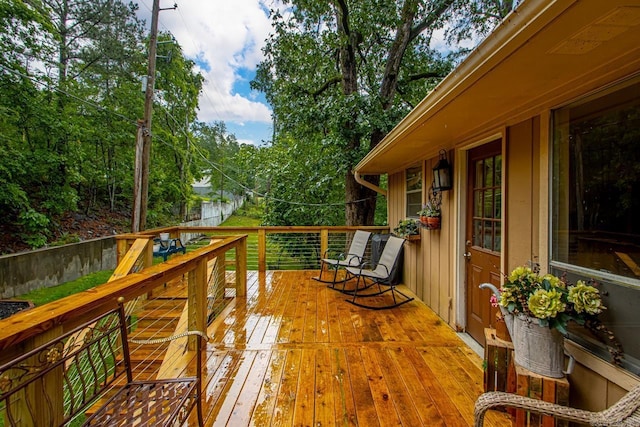 3311 Hazy Ridge Ct, Little Rock, AR 72227 - wooden terrace with view of wooded area
