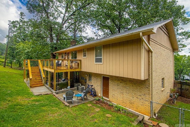 3311 Hazy Ridge Ct, Little Rock, AR 72227 - rear view of house with brick siding, a deck, stairway, a patio, and cooling unit