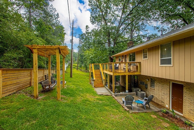 3311 Hazy Ridge Ct, Little Rock, AR 72227 - view of yard with stairs, a deck, cooling unit, and a patio area