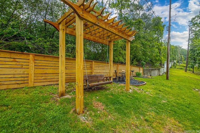 3311 Hazy Ridge Ct, Little Rock, AR 72227 - view of yard with a pergola and view of wooded area