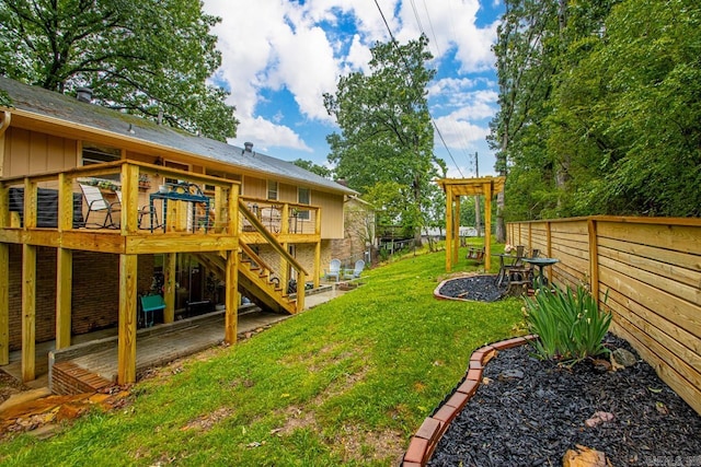 3311 Hazy Ridge Ct, Little Rock, AR 72227 - view of yard featuring a wooden deck, stairs, and a patio area