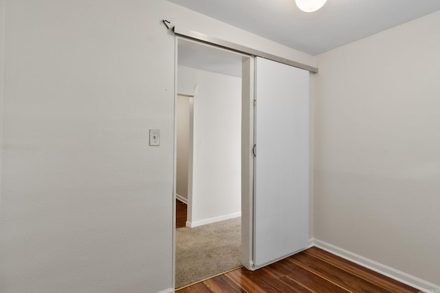 503 N Walnut St, Searcy, AR 72143 - spare room with dark wood-type flooring and baseboards