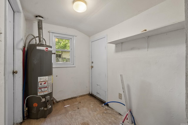 503 N Walnut St, Searcy, AR 72143 - utility room featuring gas water heater