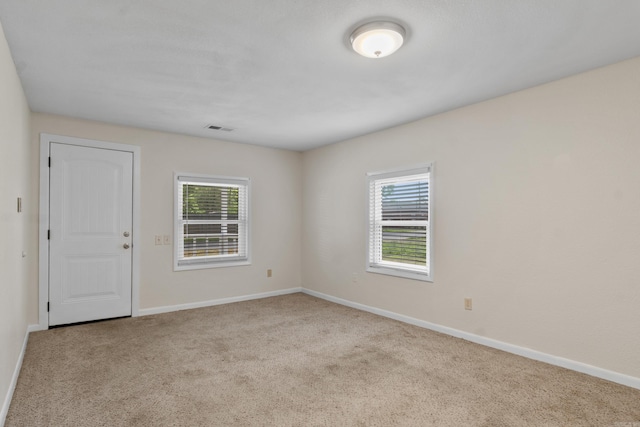 503 N Walnut St, Searcy, AR 72143 - carpeted empty room with baseboards