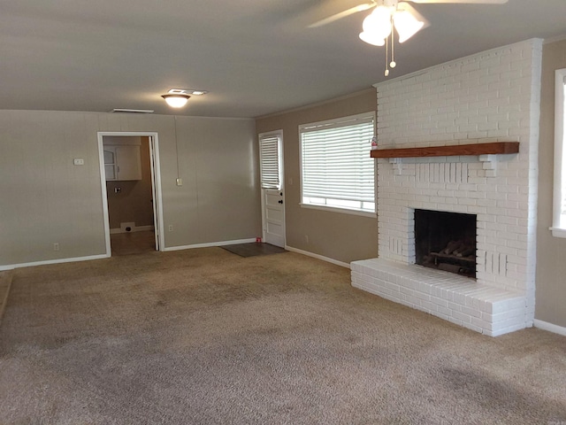 3810 Congo Rd, Benton, AR 72019 - unfurnished living room with a ceiling fan, carpet flooring, baseboards, and a brick fireplace