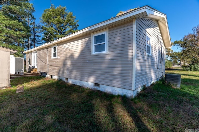 3907 Gamblin Dr, Jonesboro, AR 72404 - view of home's exterior with cooling unit, crawl space, and a yard