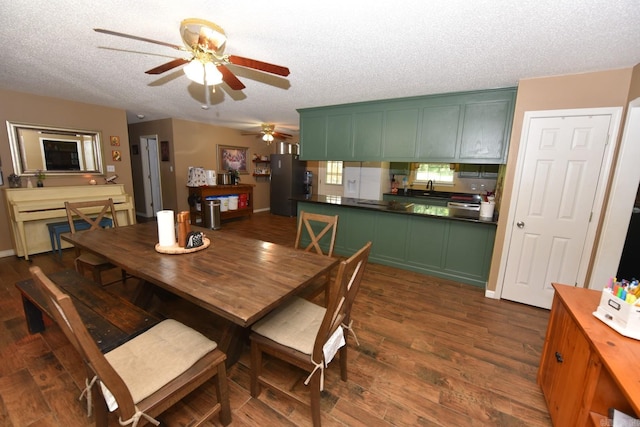 22 Primrose Ln, Greenbrier, AR 72058 - dining area with a ceiling fan, a textured ceiling, and dark wood-type flooring