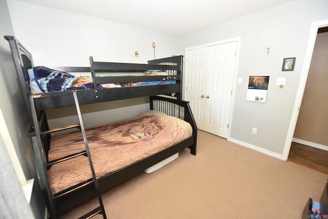 22 Primrose Ln, Greenbrier, AR 72058 - carpeted bedroom featuring a closet and baseboards