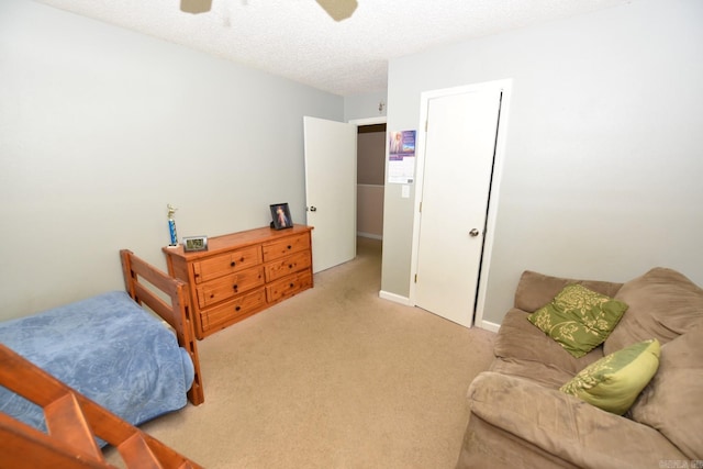 22 Primrose Ln, Greenbrier, AR 72058 - bedroom featuring light carpet, ceiling fan, and a textured ceiling