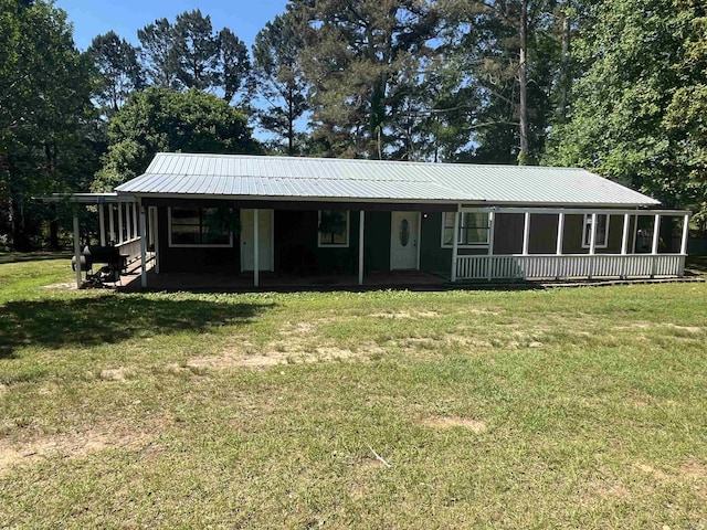 911 Apple Rd, Bonnerdale, AR 71933 - view of front of home with metal roof, a front lawn, and covered porch