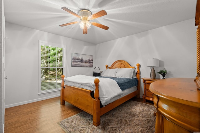 67 Delton Mccauley Rd, Kirby, AR 71950 - bedroom with baseboards, dark wood-style flooring, and ceiling fan