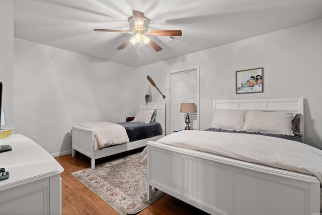 67 Delton Mccauley Rd, Kirby, AR 71950 - bedroom featuring wood finished floors and ceiling fan