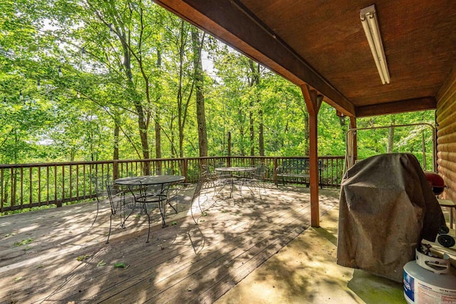 67 Delton Mccauley Rd, Kirby, AR 71950 - deck with outdoor dining area and grilling area
