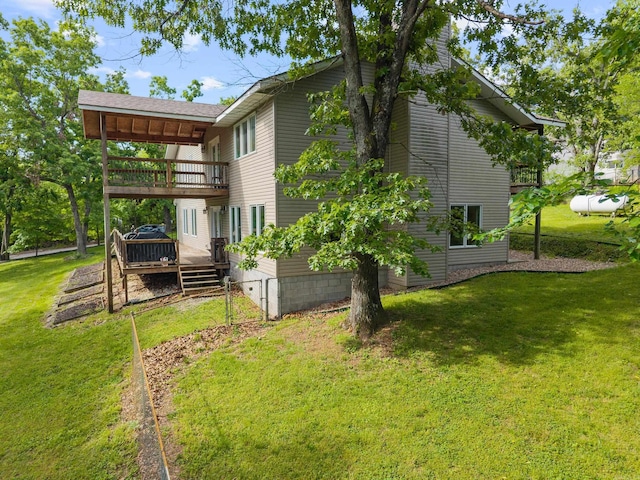 15364 Twin Pines Rd, Lowell, AR 72745 - back of property with a balcony, a wooden deck, and a yard
