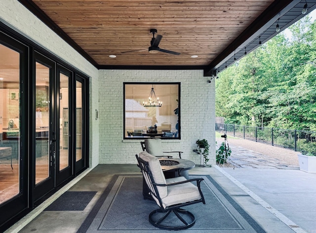 816 Nature Way, Benton, AR 72019 - view of patio featuring fence, a fire pit, and a ceiling fan