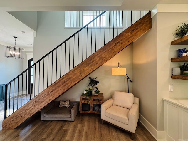 816 Nature Way, Benton, AR 72019 - stairs with wood finished floors, a chandelier, and baseboards