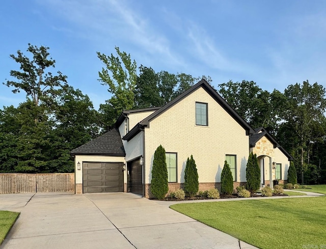 816 Nature Way, Benton, AR 72019 - view of property exterior featuring concrete driveway, brick siding, an attached garage, and a shingled roof