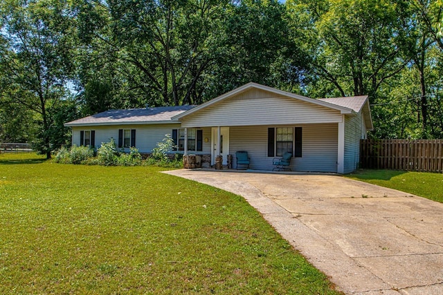 view of front facade with concrete driveway and a porch