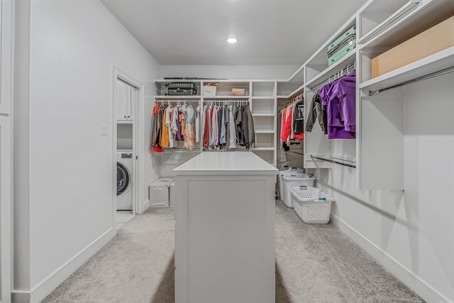 20 Caurel Ct, Little Rock, AR 72223 - spacious closet with light colored carpet and washer / clothes dryer