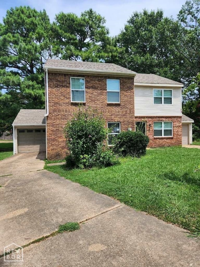1302-1304 Santa Fe, Jonesboro, AR 72401 - view of front of house with concrete driveway, a garage, brick siding, a front yard, and roof with shingles