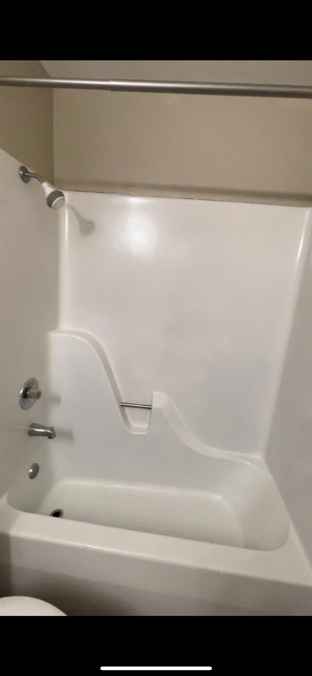 1302-1304 Santa Fe, Jonesboro, AR 72401 - full bath with shower / bath combination and toilet