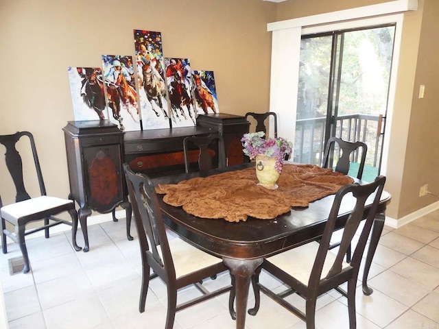 2325 Lakeshore Unit E-4, Hot Springs, AR 71913 - dining area with baseboards and light tile patterned floors