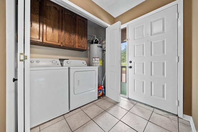 2325 Lakeshore Unit E-4, Hot Springs, AR 71913 - clothes washing area featuring cabinet space, washing machine and dryer, water heater, and light tile patterned flooring
