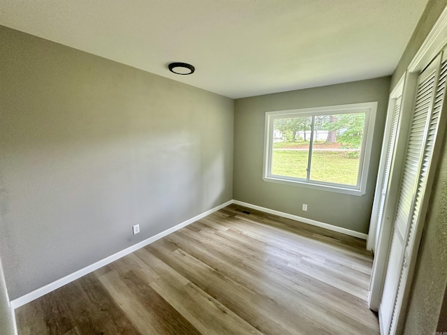 27 Grant 491 Rd, Sheridan, AR 72105 - unfurnished bedroom with baseboards and wood finished floors