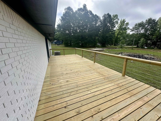 27 Grant 491 Rd, Sheridan, AR 72105 - wooden terrace with view of wooded area and a yard
