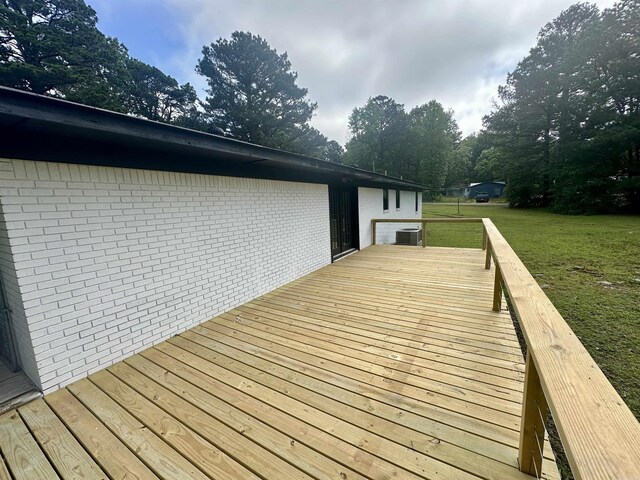 27 Grant 491 Rd, Sheridan, AR 72105 - deck featuring central AC unit and a yard