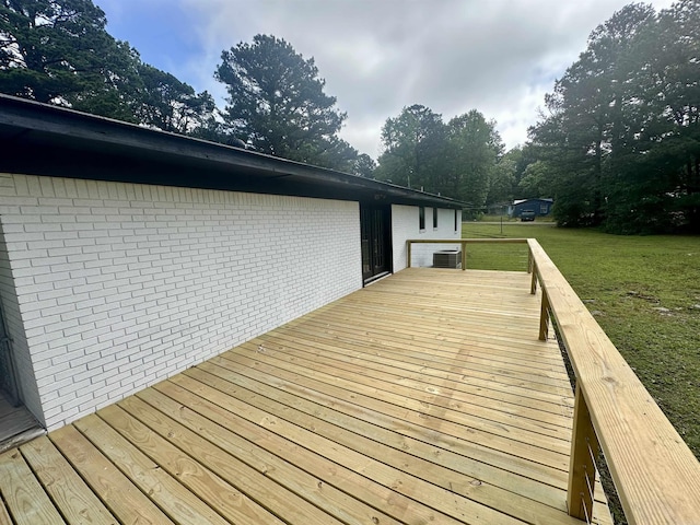 27 Grant 491 Rd, Sheridan, AR 72105 - wooden deck featuring a yard and central air condition unit