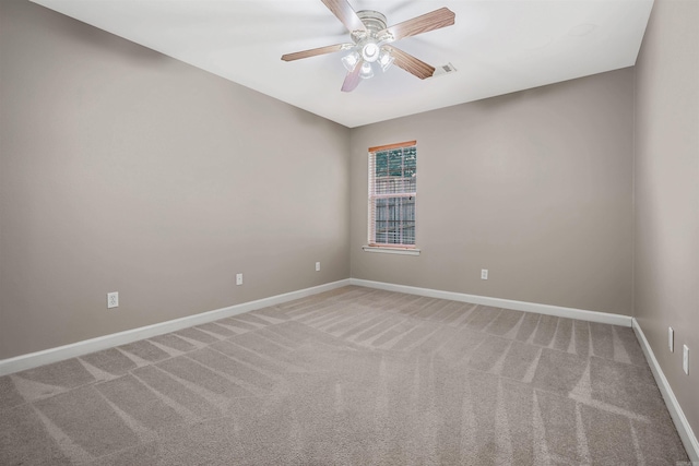 1010 Claycut Cir, North Little Rock, AR 72116 - unfurnished room with baseboards, light colored carpet, and ceiling fan