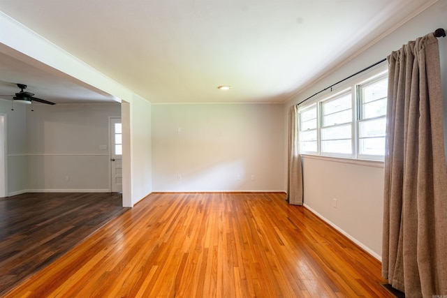 824 Sunnyhill St, Searcy, AR 72143 - spare room featuring hardwood / wood-style flooring, baseboards, ceiling fan, and ornamental molding