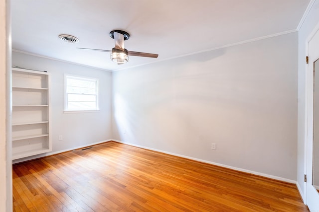 824 Sunnyhill St, Searcy, AR 72143 - unfurnished bedroom with light wood finished floors, crown molding, baseboards, and a ceiling fan