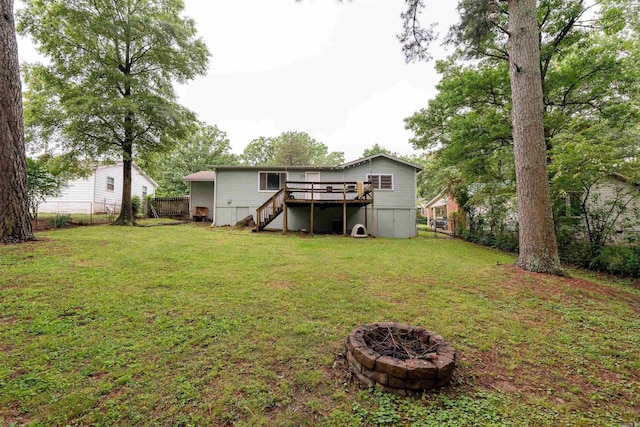 824 Sunnyhill St, Searcy, AR 72143 - view of yard featuring stairs, a deck, and a fire pit