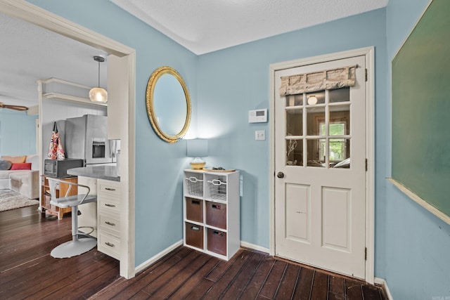 42 Desoto Cir, North Little Rock, AR 72116 - entrance foyer featuring dark wood-style floors and baseboards