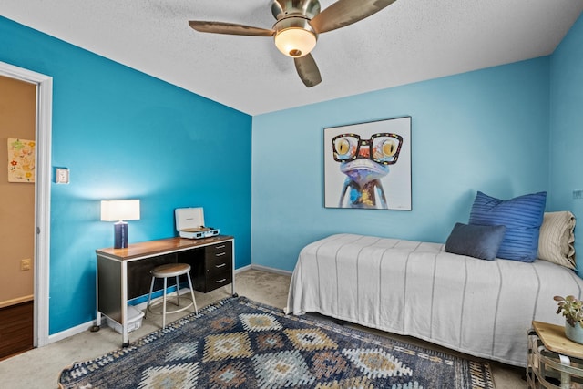42 Desoto Cir, North Little Rock, AR 72116 - bedroom featuring carpet flooring, baseboards, a ceiling fan, and a textured ceiling