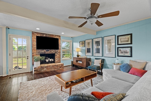 42 Desoto Cir, North Little Rock, AR 72116 - living area featuring wood-type flooring, ornamental molding, a ceiling fan, a textured ceiling, and beamed ceiling