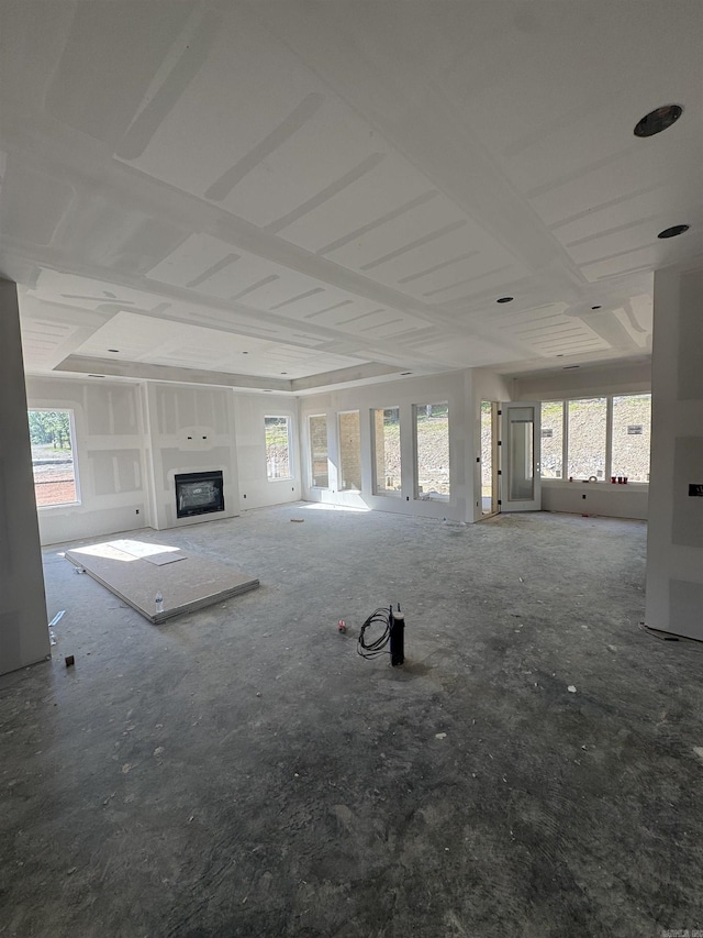 143 Kinley Loop, Little Rock, AR 72223 - unfurnished living room featuring a glass covered fireplace