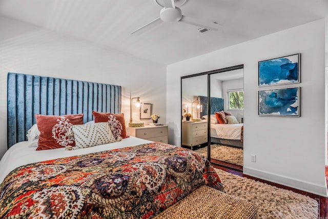 2510 Riverfront # 2, Little Rock, AR 72202 - bedroom featuring wood finished floors, a closet, baseboards, and a ceiling fan