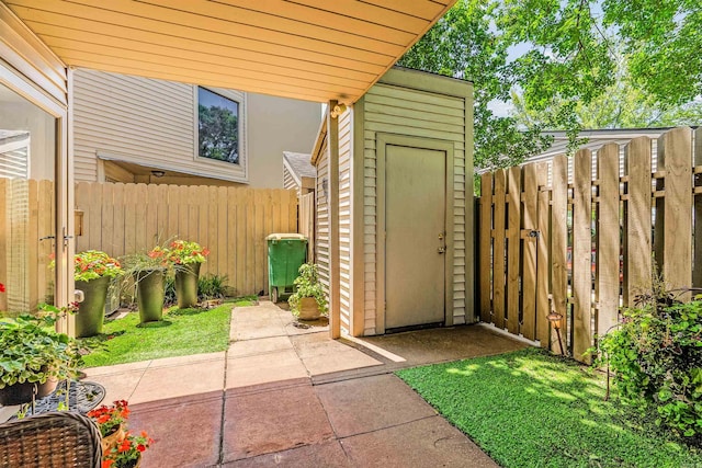 2510 Riverfront # 2, Little Rock, AR 72202 - view of shed featuring fence and a gate