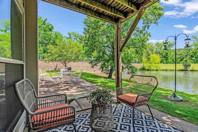2510 Riverfront # 2, Little Rock, AR 72202 - view of patio / terrace with a water view and view of wooded area