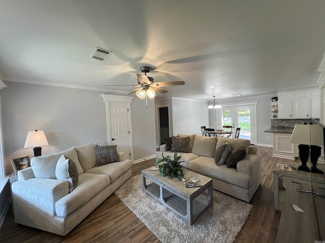 1906 Fernwood Cv, Benton, AR 72015 - living room with dark wood-type flooring, ceiling fan, french doors, and baseboards
