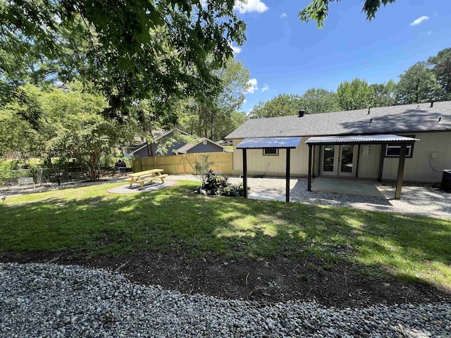 1906 Fernwood Cv, Benton, AR 72015 - view of yard featuring a patio and french doors