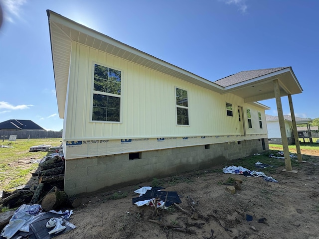 135 Jl Loop, Southside, AR 72501 - view of home's exterior featuring crawl space and a shingled roof