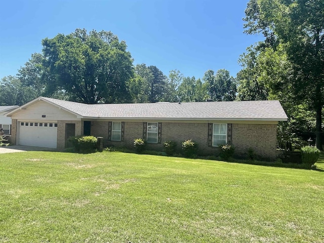 1410 Rock Creek Dr, Benton, AR 72019 - ranch-style home with a garage, brick siding, a front yard, and roof with shingles